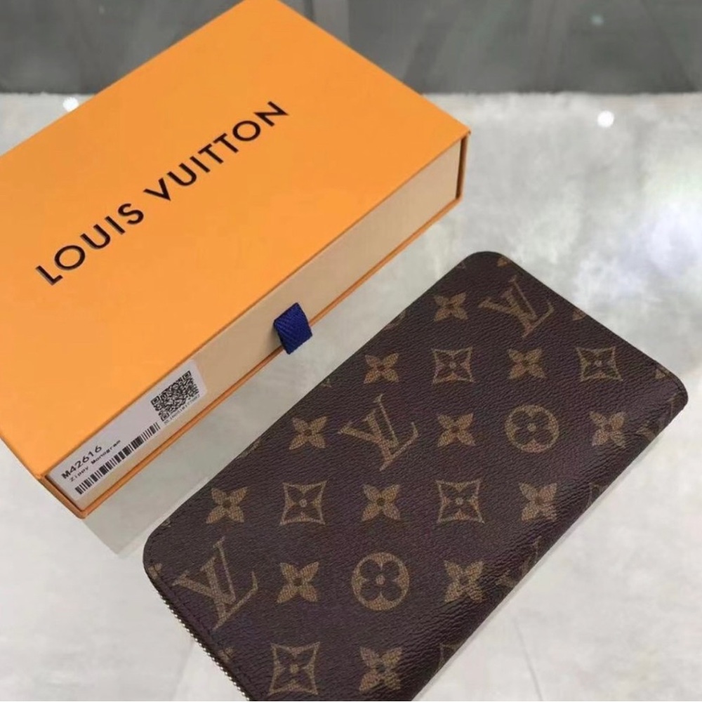 Zip around brown leather Louis Vuitton monogram zippy wallet.